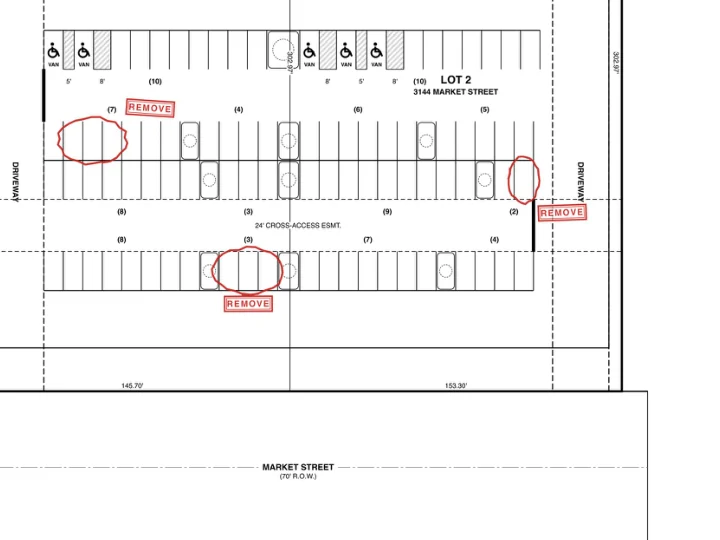 Parking plan with red city-review ovals and REMOVE stamps over some spaces.