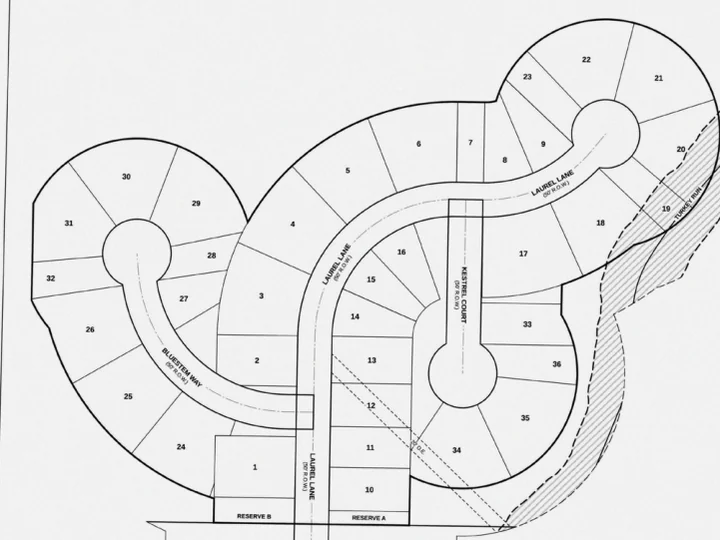 Curved lots, cul-de-sacs and a hatched flood zone with lot numbers.